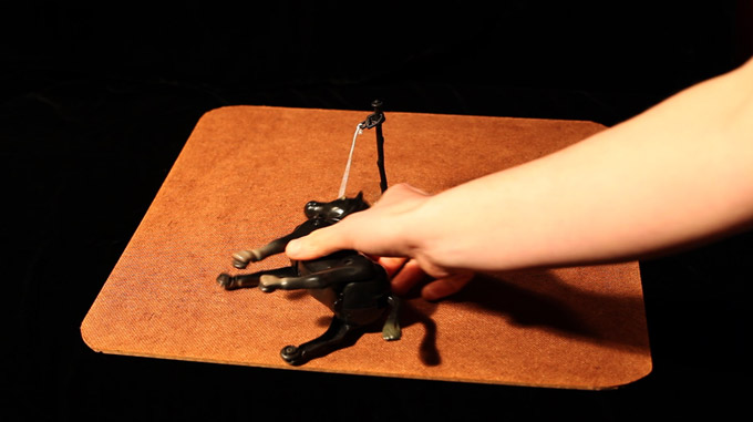 Jack McManus, press image in the Irish Times, 1988, of Charles Haughey posing with a painting by Tim Rollins and KOS 