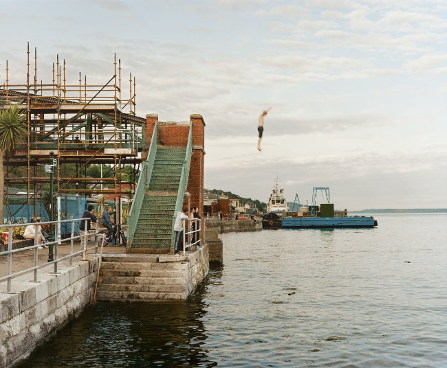 Doug DuBois, Sweeny Jumps into Cork Harbour, 2012, photograph, 84 x 102 cm. Purchased, Sirius Arts Centre, 2013. © the artist