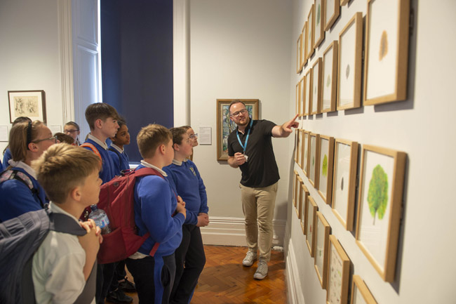 Dr Michael Waldron directs students viewing the exhibits at the Crawford Art Gallery, Cork. Photo: Provision