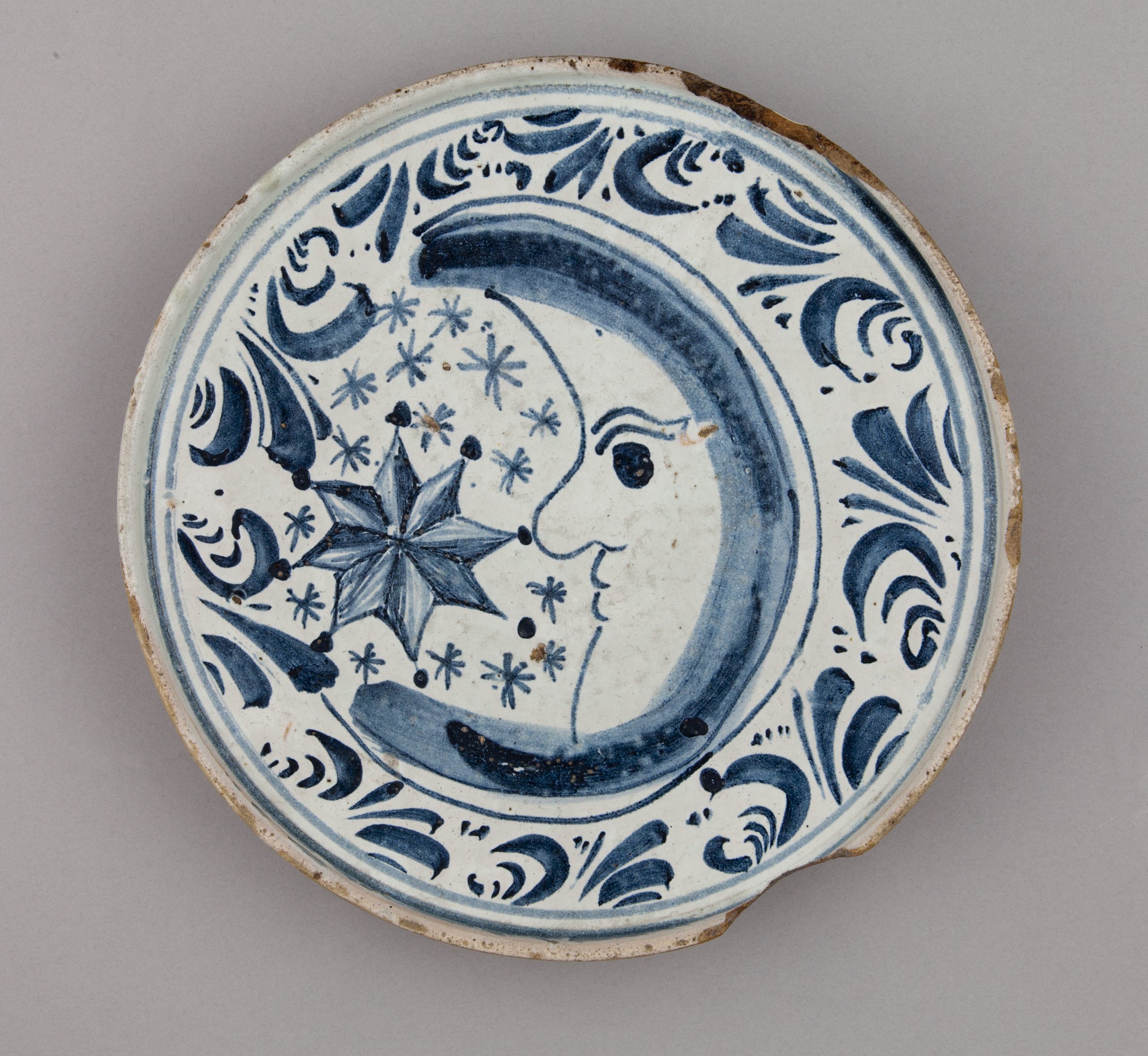 Spanish School, Platter or Tazza (with star and crescent motif), 18th century, tin-glazed earthenware, diameter 27 cm. Donated, Joseph Stafford Gibson, 1919 (Gibson Bequest).